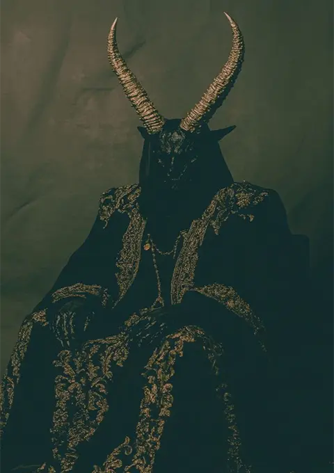 Horned entity on throne wearing a goat mask