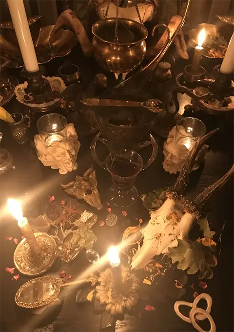 Copper ritual tools and candles for advanced witchcraft spellwork