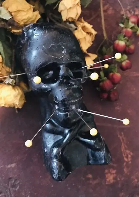 Black skull used in witchcraft and voodoo rituals for black magic removal and curse breaking
